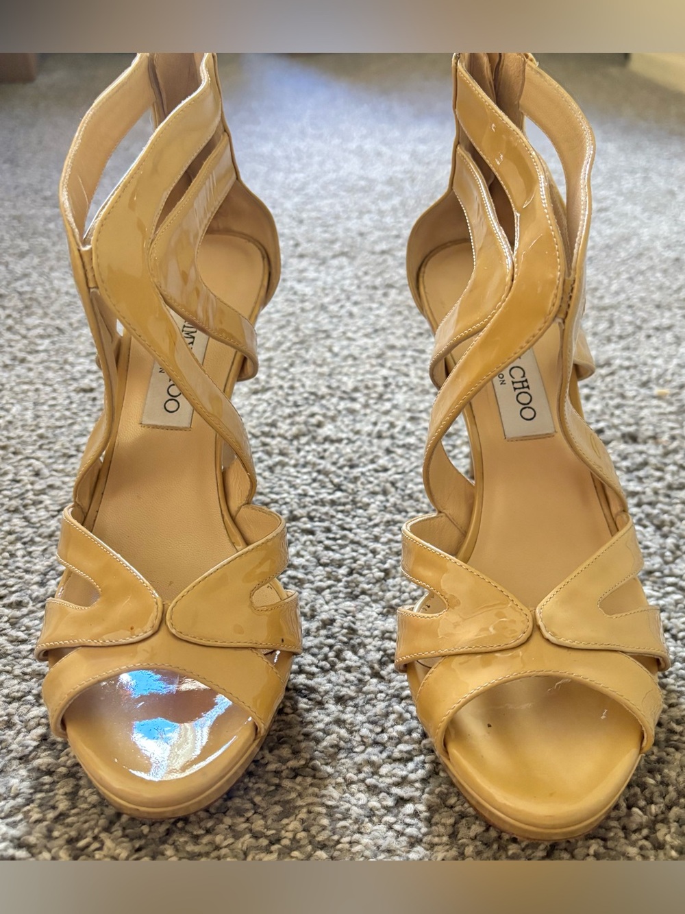 Jimmy Choo "Vamp" Strappy Stiletto Sandals in nude/beige patent leather. Size 7